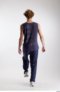 Urien  1 back view blue tank top blue track…